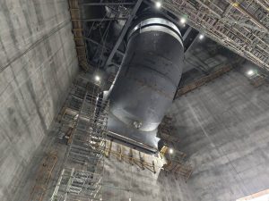 Elbow section of the flue where it meets the flue gas treatment system