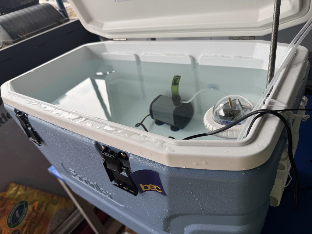 Hand immersion cooling system setup on industrial worksite